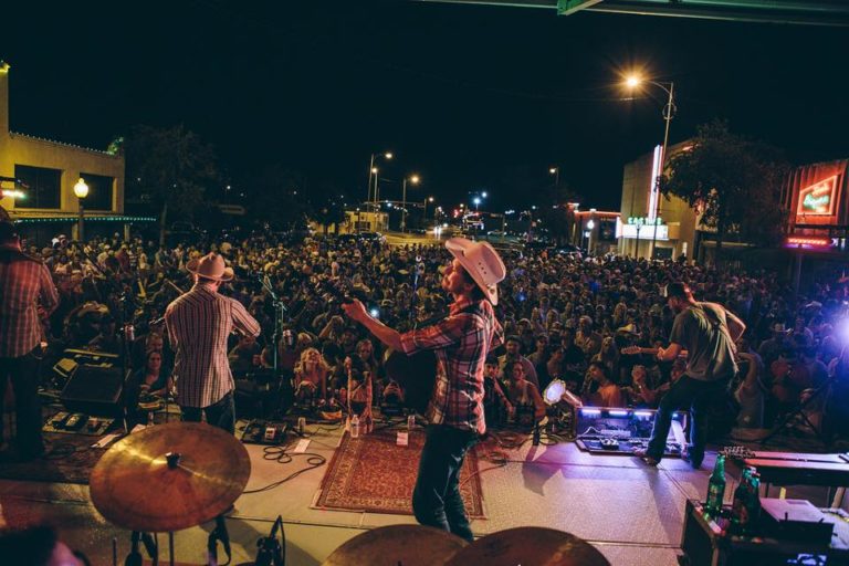 Turnpike Troubadoors street show blue light Lubbock Cultural District